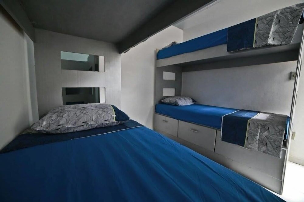 Кровать в общем номере Hotel e Hóstel Evangélico Brás