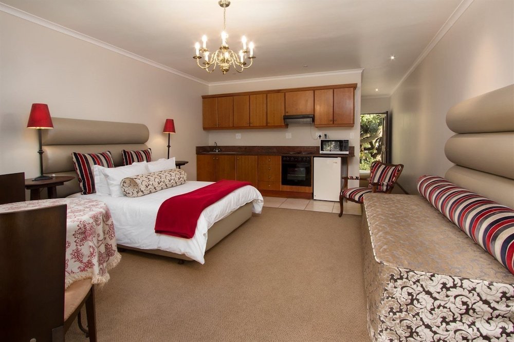 Luxus Doppel Zimmer 1 Schlafzimmer mit Bergblick Milkwood Lodge