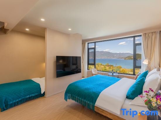 Suite familiare 2 camere duplex con vista sul lago Luguhuxingyeyunshanwang Hotel