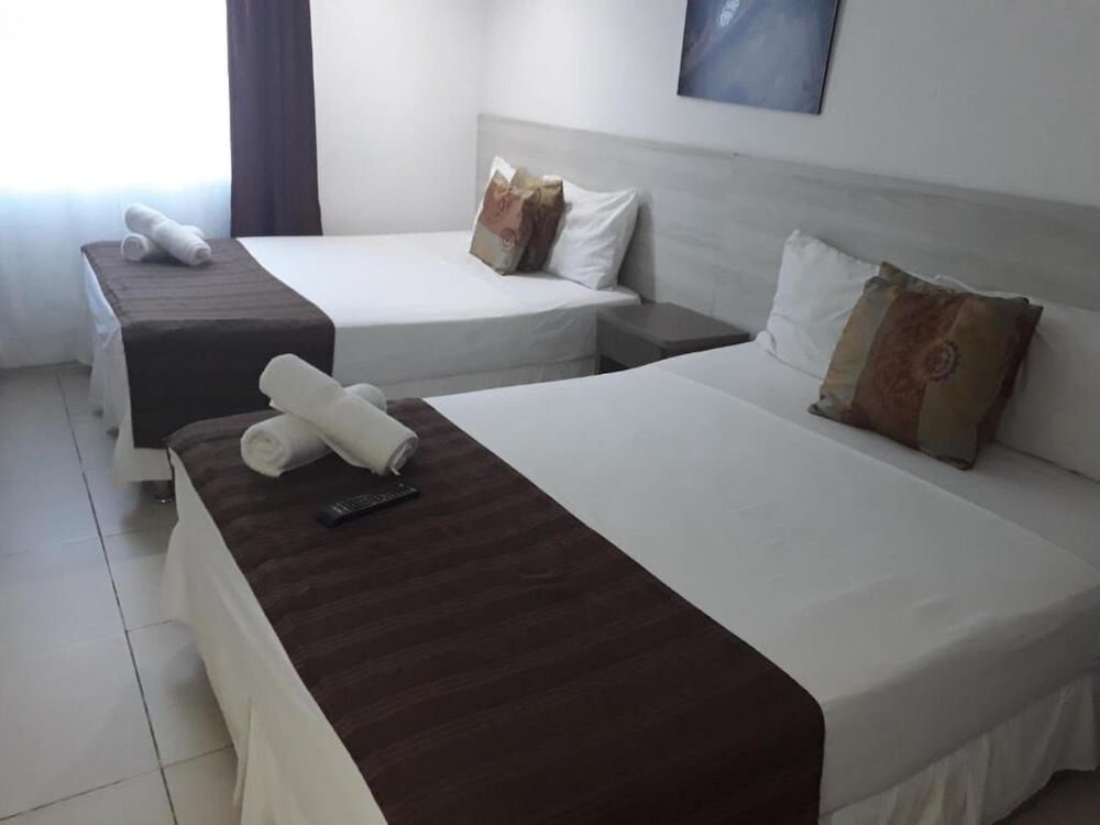Четырёхместный семейный номер Standard Mintaka Hotel + Lounge