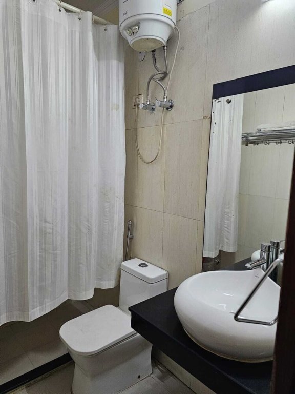 Affaires chambre Blue Bell Hotel - Greater Noida