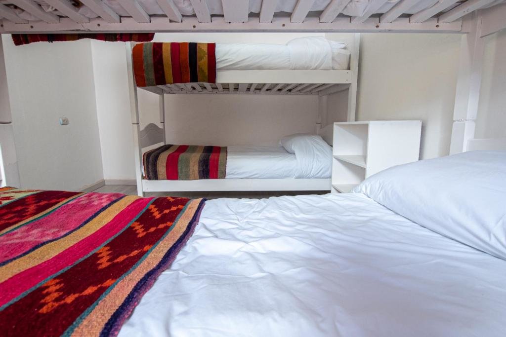 Кровать в общем номере Hostal Copart