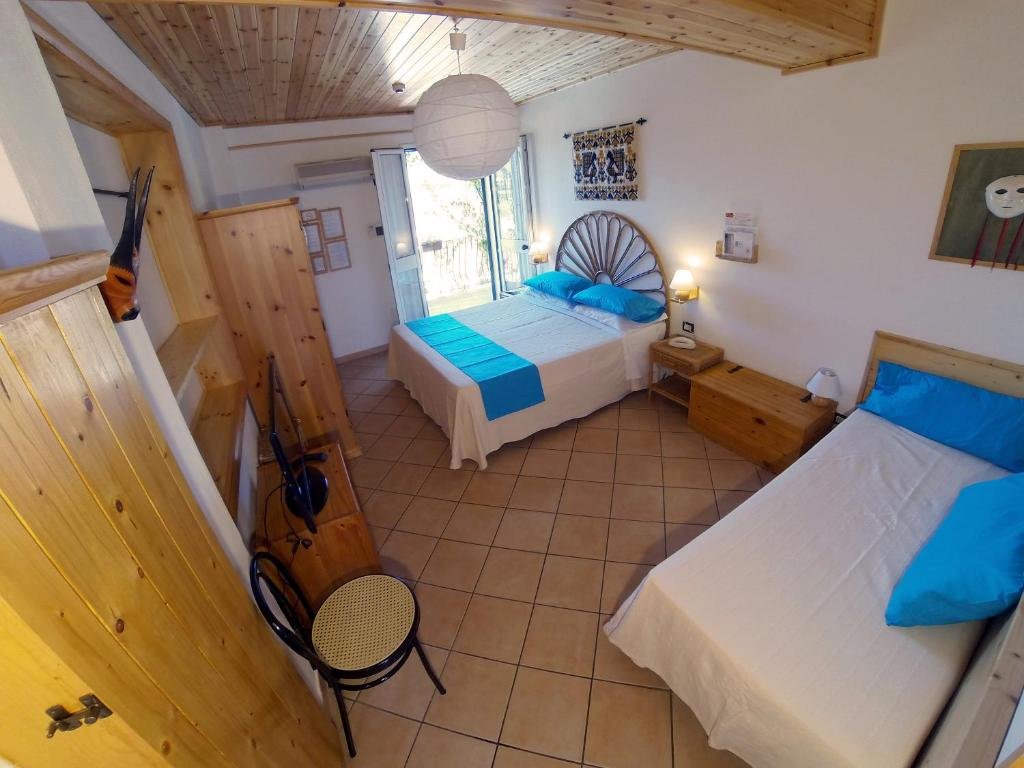 Апартаменты c 1 комнатой с видом на море Domus De Janas Sul Mare