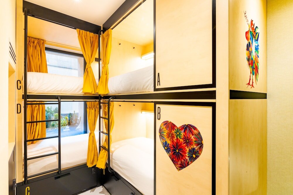 Кровать в общем номере Petit Hostel Palacio Real