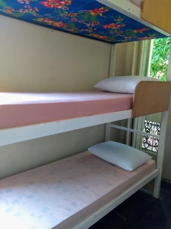 Кровать в общем номере Lapa Casa