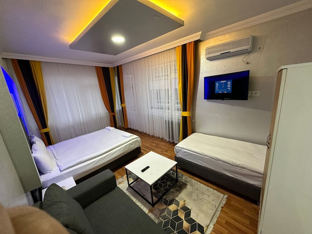 Habitación triple Estándar 1 dormitorio Yildirim Sui̇t Apart Otel