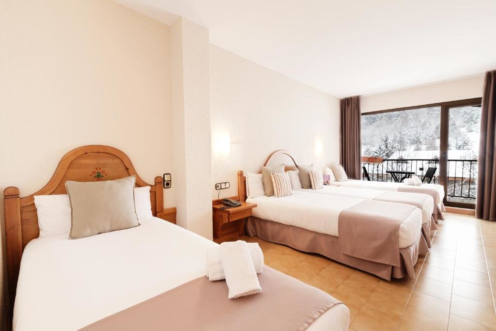 Superior Quadruple room Hotel Sant Gothard