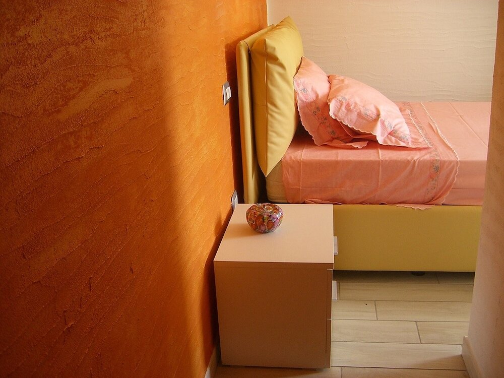 Cama en dormitorio compartido Solivariu Village Affittacamere - Deluxe King Room
