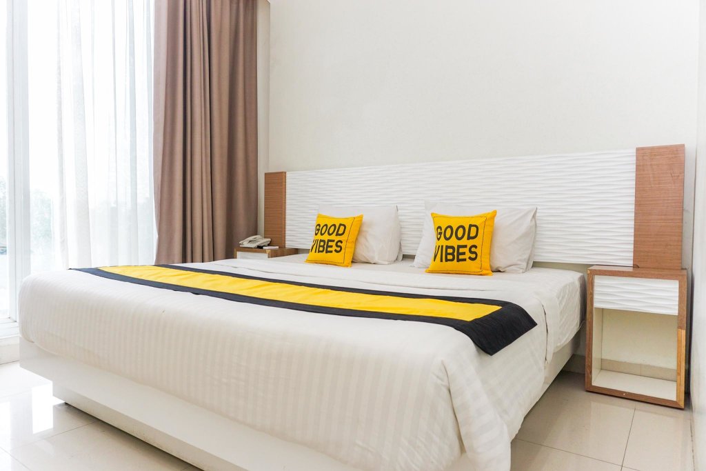Кровать в общем номере Diemdi Hotel