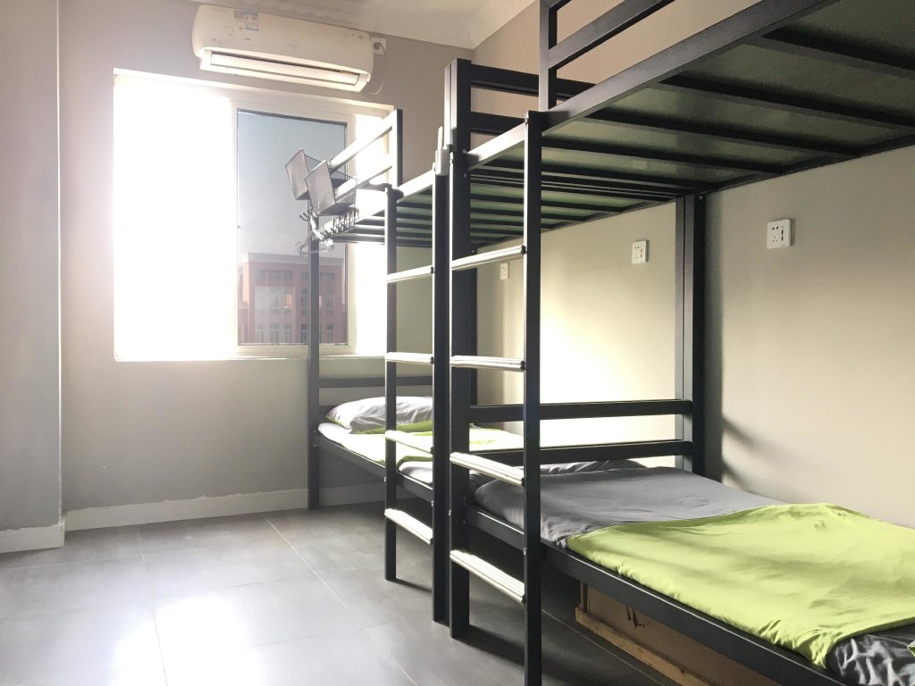 Cama en dormitorio compartido (dormitorio compartido masculino) Music Bar International Youth Apartment Beihai