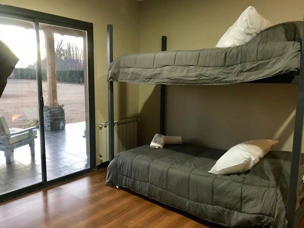 Кровать в общем номере Valley House Uco Experience