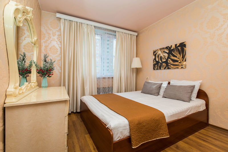 Bett im Wohnheim 2 Schlafzimmer HomeHotel Akimova 22B Apart-hotel