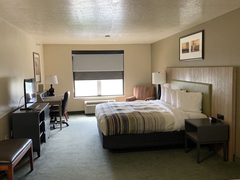 Premium Quadruple room Country Inn & Suites