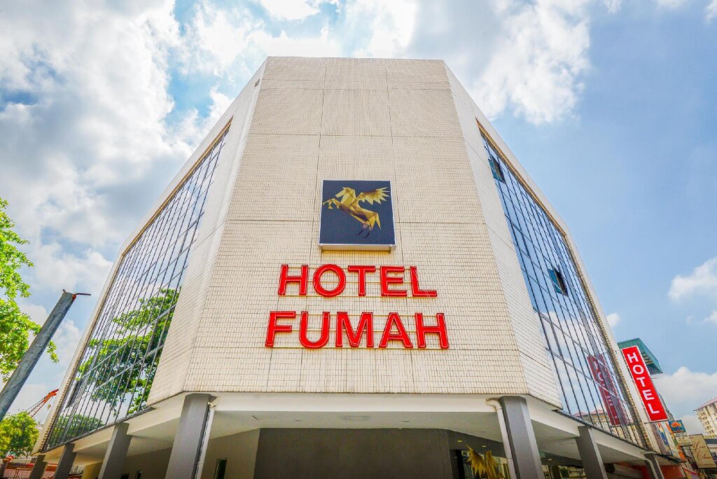 Кровать в общем номере Fumah Hotel Kepong