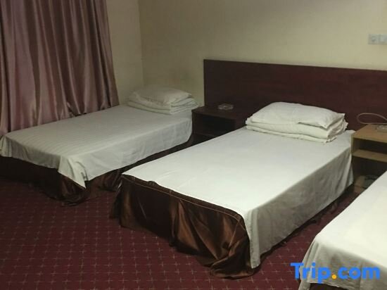 Cama en dormitorio compartido Songjiatang Hotel