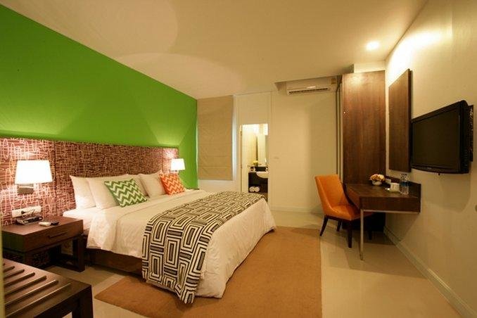 Кровать в общем номере Legacy Hotel Bangkok Sukhumvit