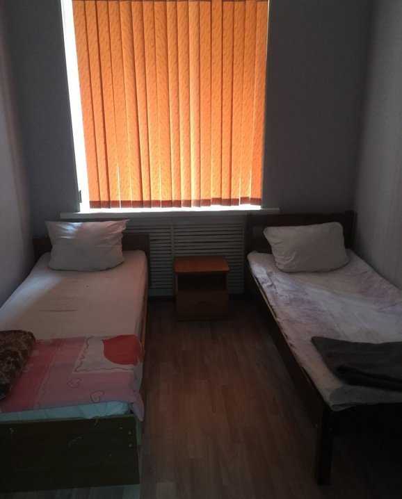 Cama en dormitorio compartido Yugra life