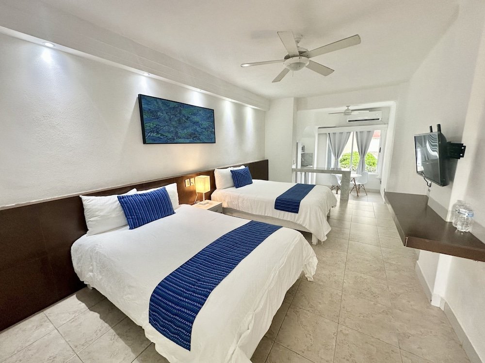 Четырёхместная студия Standard цокольный этаж с видом на бассейн Cancun Plaza - Best Beach