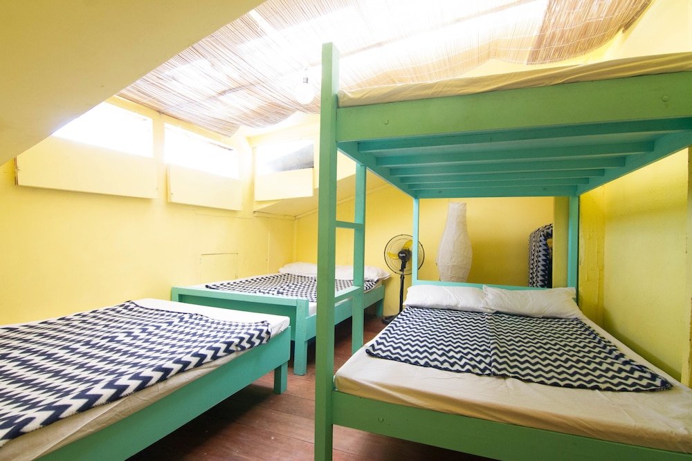 Bed in Dorm Go Surfari House
