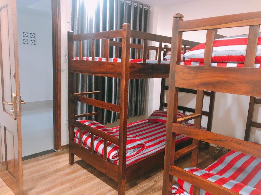 Кровать в общем номере Le Grey Dalat Hotel