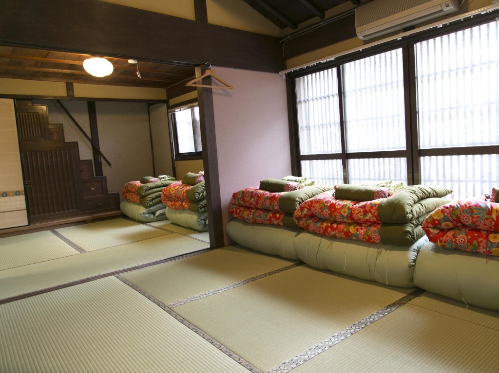 Кровать в общем номере Female-Only Guesthouse Tomari-ya