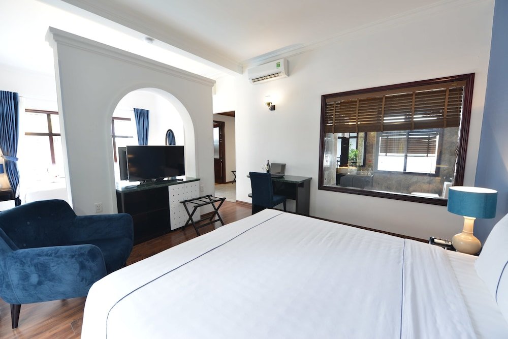 Standard room with balcony and with pool view TTC Hotel - Hoi An
