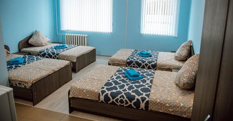 Кровать в общем номере SV Гостиница