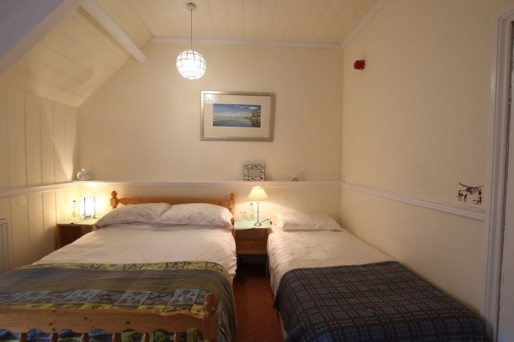 Standard Triple room with garden view The Druidstone Hotel