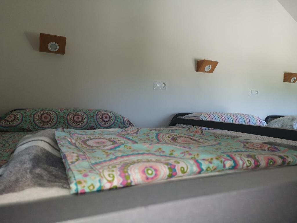 Кровать в общем номере Langre Wayve House