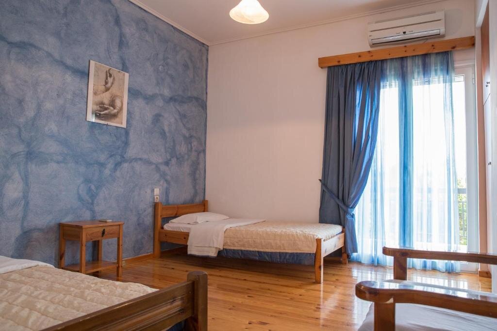 Standard Quadruple room with balcony and with view Philoxenia Apartments