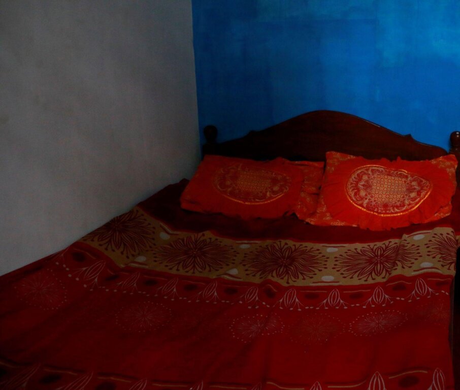 Кровать в общем номере Gunung Kucing Hospiz