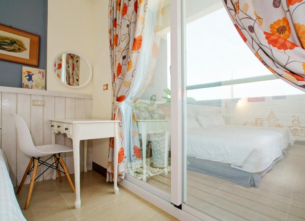 Standard Vierer Zimmer mit Balkon Walk in the Wind Homestay