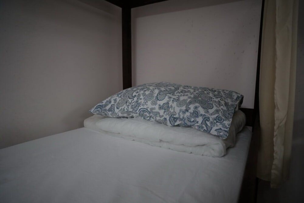 Кровать в общем номере Хостел «Прогресс»