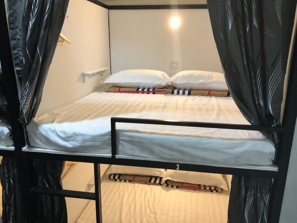 Кровать в общем номере OSS Backpackers Hostel