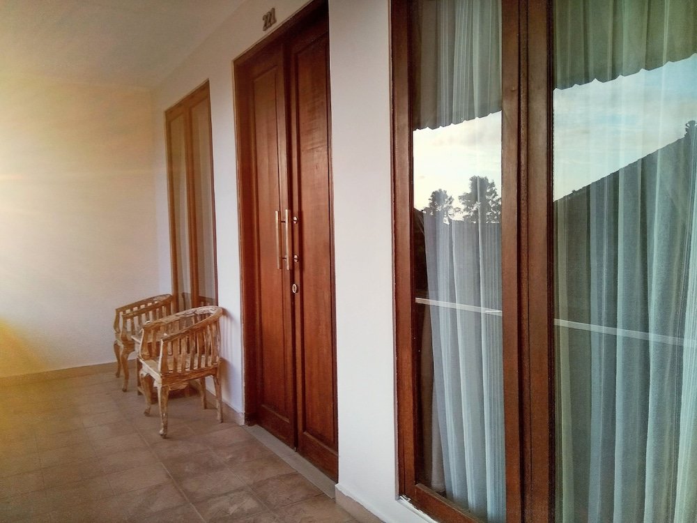Deluxe room with balcony Nipuri Resort Seminyak by Kamara