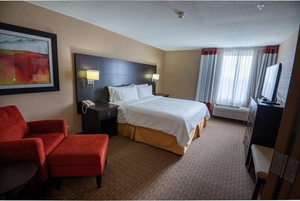 Suite 1 camera da letto Holiday Inn Express Hotel & Suites Chatham South, an IHG Hotel