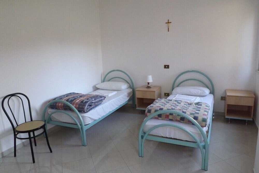 Кровать в общем номере (мужской номер) Ostello Il Volto