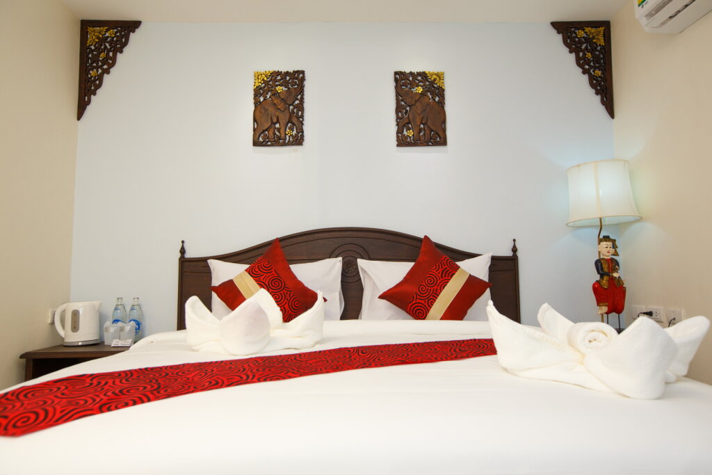 Кровать в общем номере Chang Siam Inn