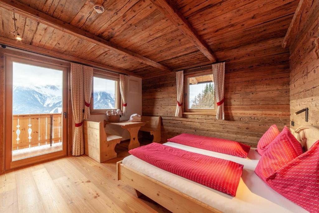 Standard Vierer Zimmer mit Balkon Glinzhof Mountain Natur Resort Agriturismo