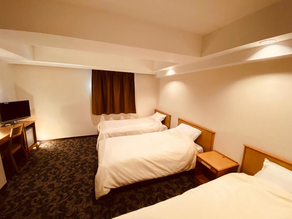 Standard triple chambre Nansei Kanko Hotel