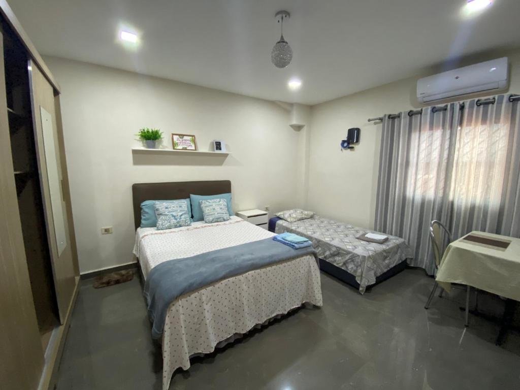 Suite Agradable dormitorio en suite con estacionamiento privado
