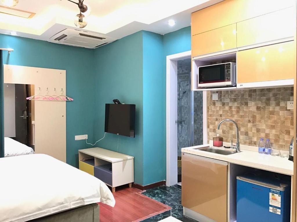 Апартаменты c 1 комнатой Guangzhou Xingke Apartment