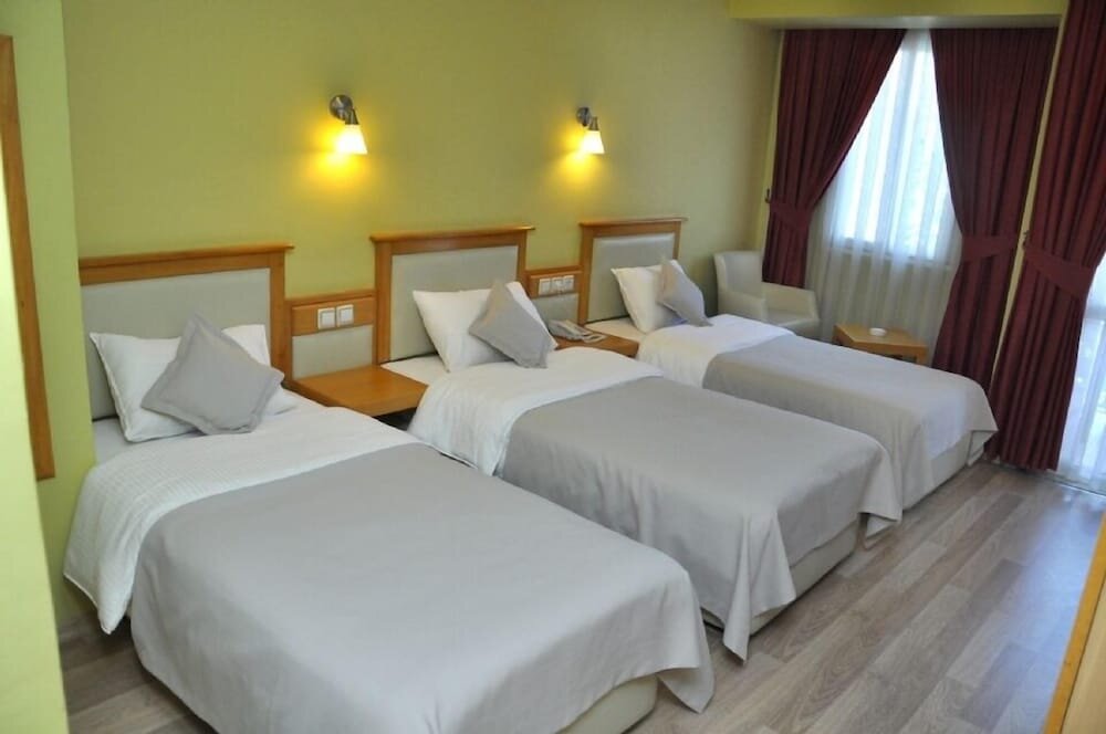Standard triple chambre avec balcon Hotel Doruk
