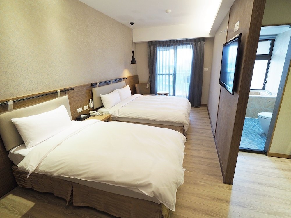 Standard triple chambre avec balcon Kailan Hotel