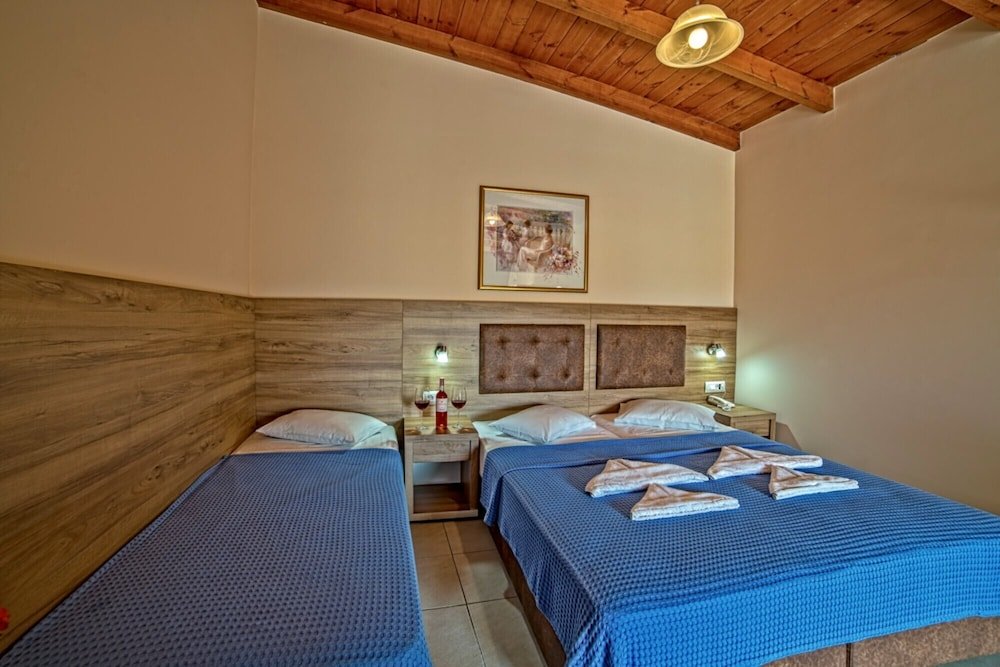 Standard Triple room with balcony and with pool view Blue Aegean Hotel & Suites