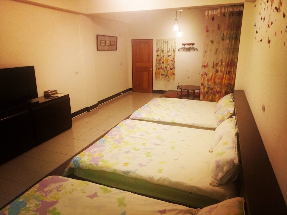 Кровать в общем номере Tainan Here Hostel