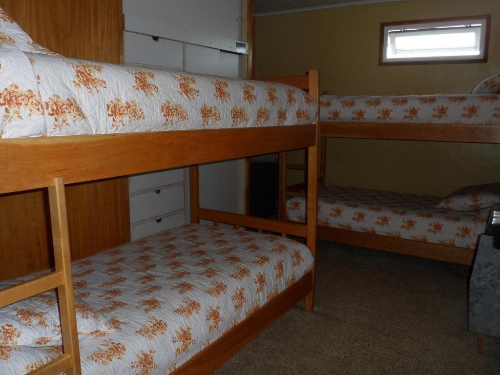 Кровать в общем номере Hostel Danicar Puerto Natales