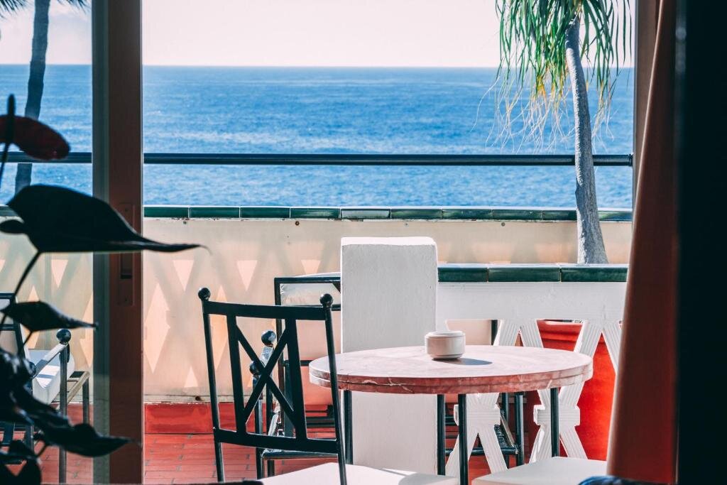 Люкс с видом на море Hotel Carabeo