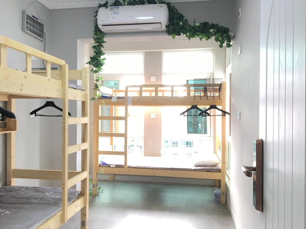 Cama en dormitorio compartido Music Bar International Youth Apartment Beihai