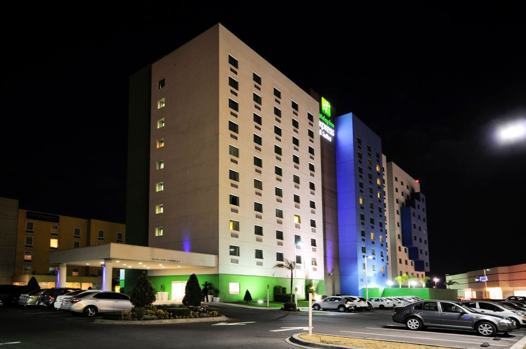 Кровать в общем номере Holiday Inn Express Hotel & Suites Toluca Zona Aeropuerto, an IHG Hotel